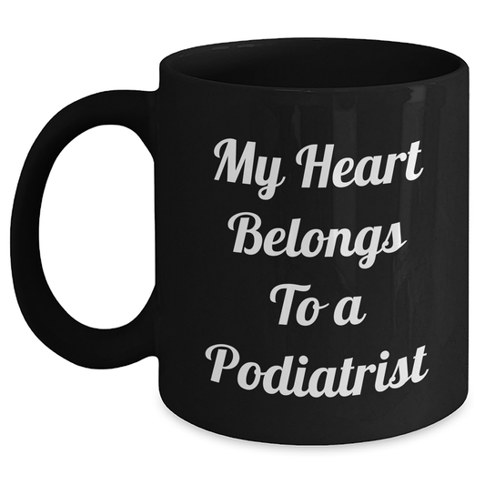 Funny Podiatrist Gifts from Friends - 'My Heart Belongs To A Podiatrist' Black Coffee Mug for Graduation - Main