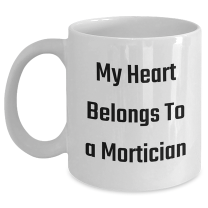 Funny Mortician Gifts, My Heart Belongs To A Mortician White Coffee Mug, Unique Father's Day Unique Gift for Mortician Men from Family - Main