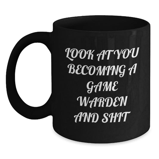 Funny Game Warden Gifts from Family - Black Coffee Mug for Game Warden Graduation with 'Look At You Becoming A Game Warden And Shit' Quote - Main