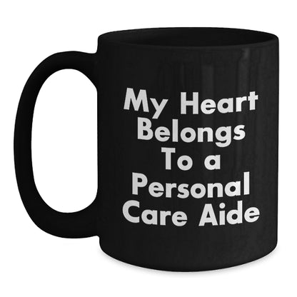 Cute Personal Care Aide Gifts from Men to Women, Unique Birthday Unique Gifts for Personal Care Aide, Funny Black Coffee Mug, 'My Heart Belongs To A Personal Care Aide' - Main