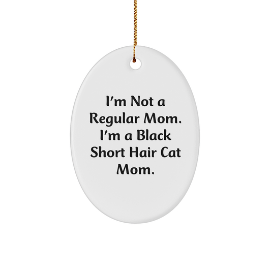 Funny Black Short Hair Cat Mom Gifts for Christmas, Oval Ornament from Friends, 'I'm Not A Regular Mom. I'm A Black Short Hair Cat Mom.' - Image 1