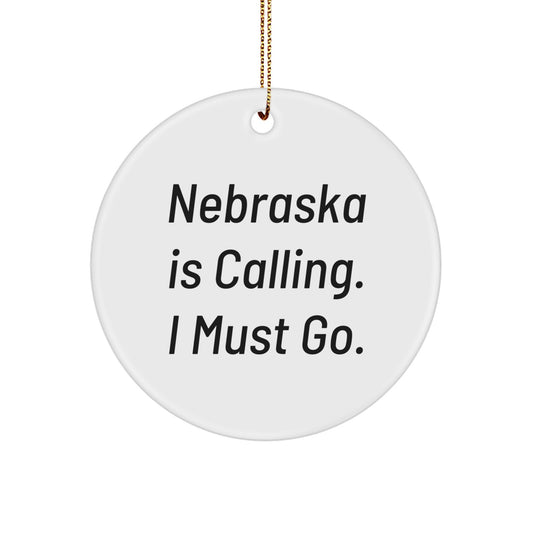 Funny Nebraska Circle Ornament Gifts from Family, Friends, or Men, Women - 'Nebraska Is Calling. I Must Go.' - Image 1