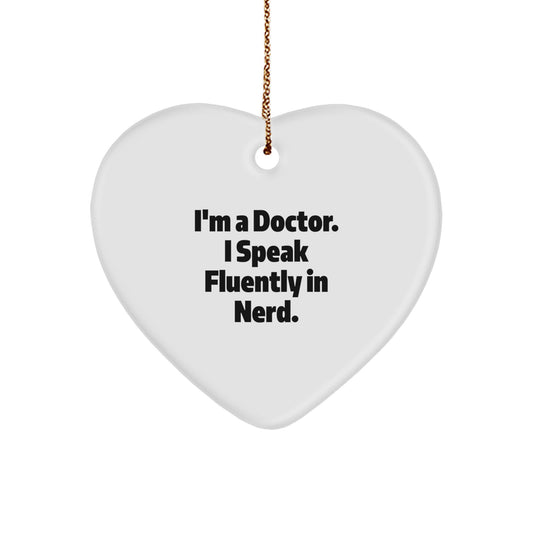 Doctor's Heart Ornament Gift for Christmas - 'I'm A Doctor. I Speak Fluently In genius.' Funny Quote, Gift from Men to Doctor Friends, Unique Christmas Unique Gifts for Doctor, Heart-Shaped Ornament - Image 1