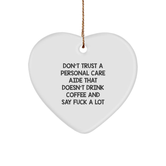 Funny Personal Care Aide Gifts from Friends for Christmas Unique Heart Ornament, 'Don't Trust A Personal Care Aide That Doesn't Drink Coffee And Say F*** A Lot' Decoration - Image 1