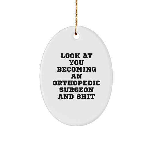 Funny Orthopedic Surgeon Oval Ornament Gifts from Friends, Christmas Unique Gifts for Orthopedic Surgeon, Look At You Becoming An Orthopedic Surgeon And Shit - Image 1