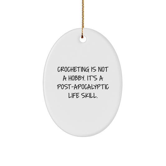 Christmas Unique Gifts for Crocheting Enthusiasts - 'Crocheting Is Not A Hobby. It's A Post-apocalyptic Life Skill.' Oval Ornament Gifts from Friends - Image 1