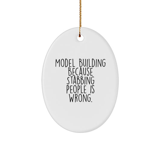 Funny Model Building Oval Ornament For Friends Gifts from Men, Christmas Unique Gifts for Model Building Enthusiasts - Oval Ornament, Quote: 'Model Building Because Stabbing People Is Wrong.' - Image 1