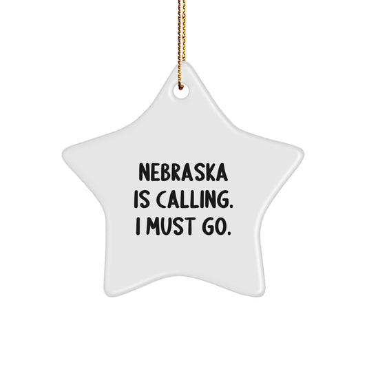 Funny Nebraska Gifts for Women from Family - Star Ornament with 'Nebraska Is Calling. I Must Go.' Quote, White Star Shape, Christmas Unique - Image 1
